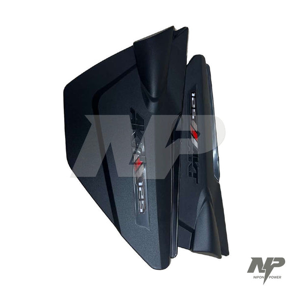 Tapas laterales AKT NKD 125 color rojo
